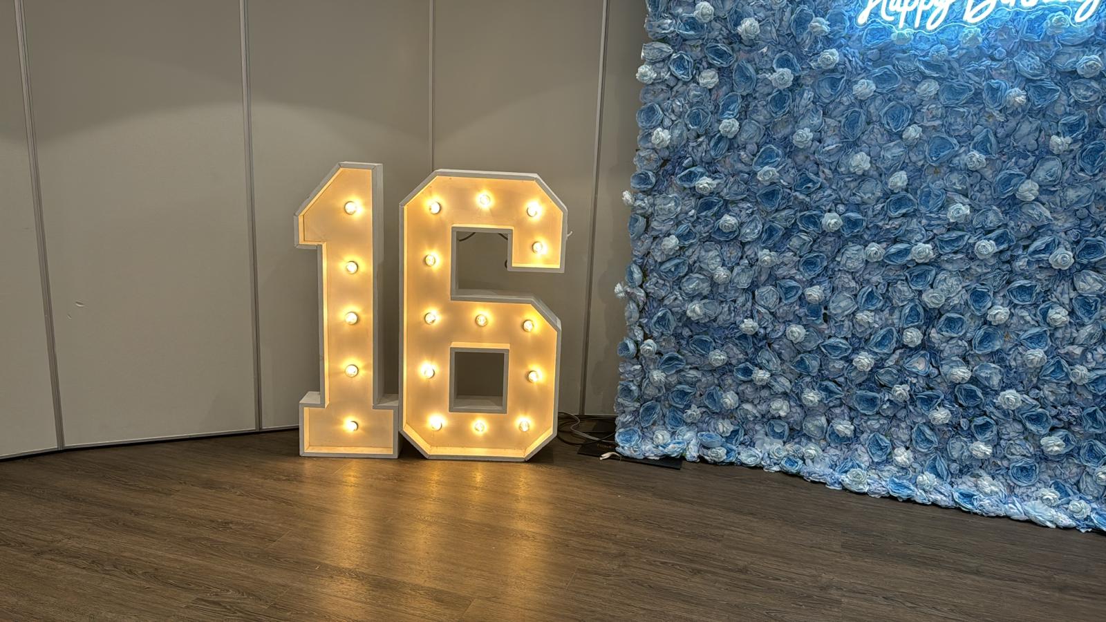 marquee numbers and flower wall rental